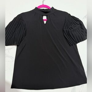 Black top with pleated sleeves